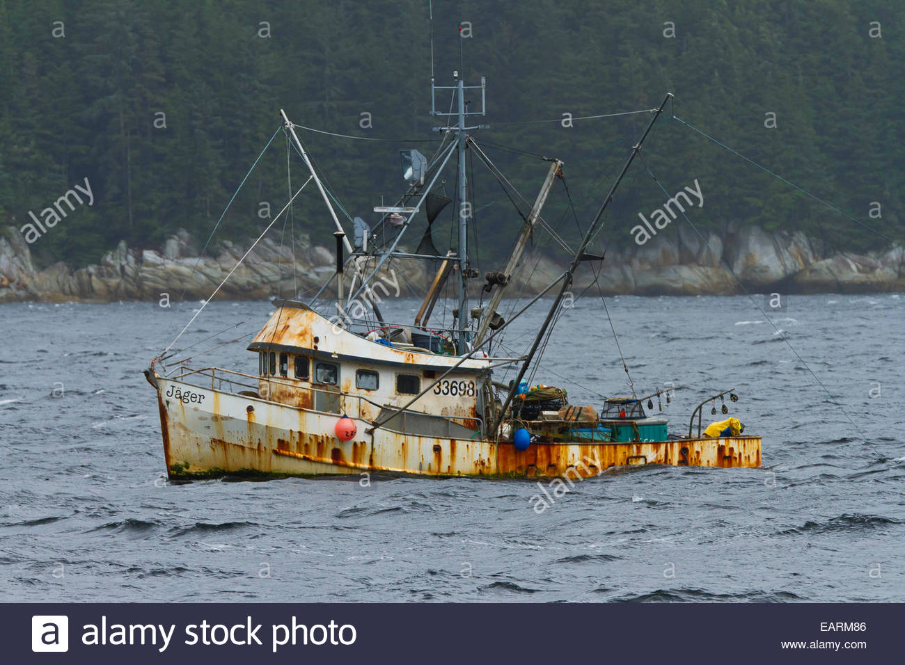Rusty fishing boat on the Chatham Strait. Stock Photo