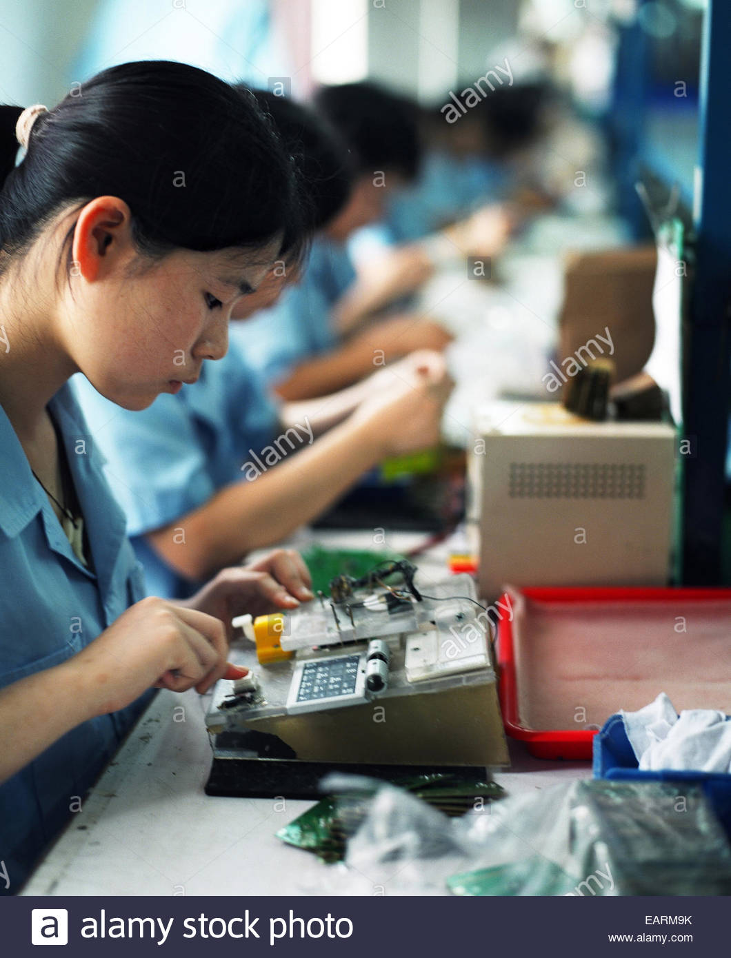 China Women Assembly Line Stock Photos & China Women Assembly Line