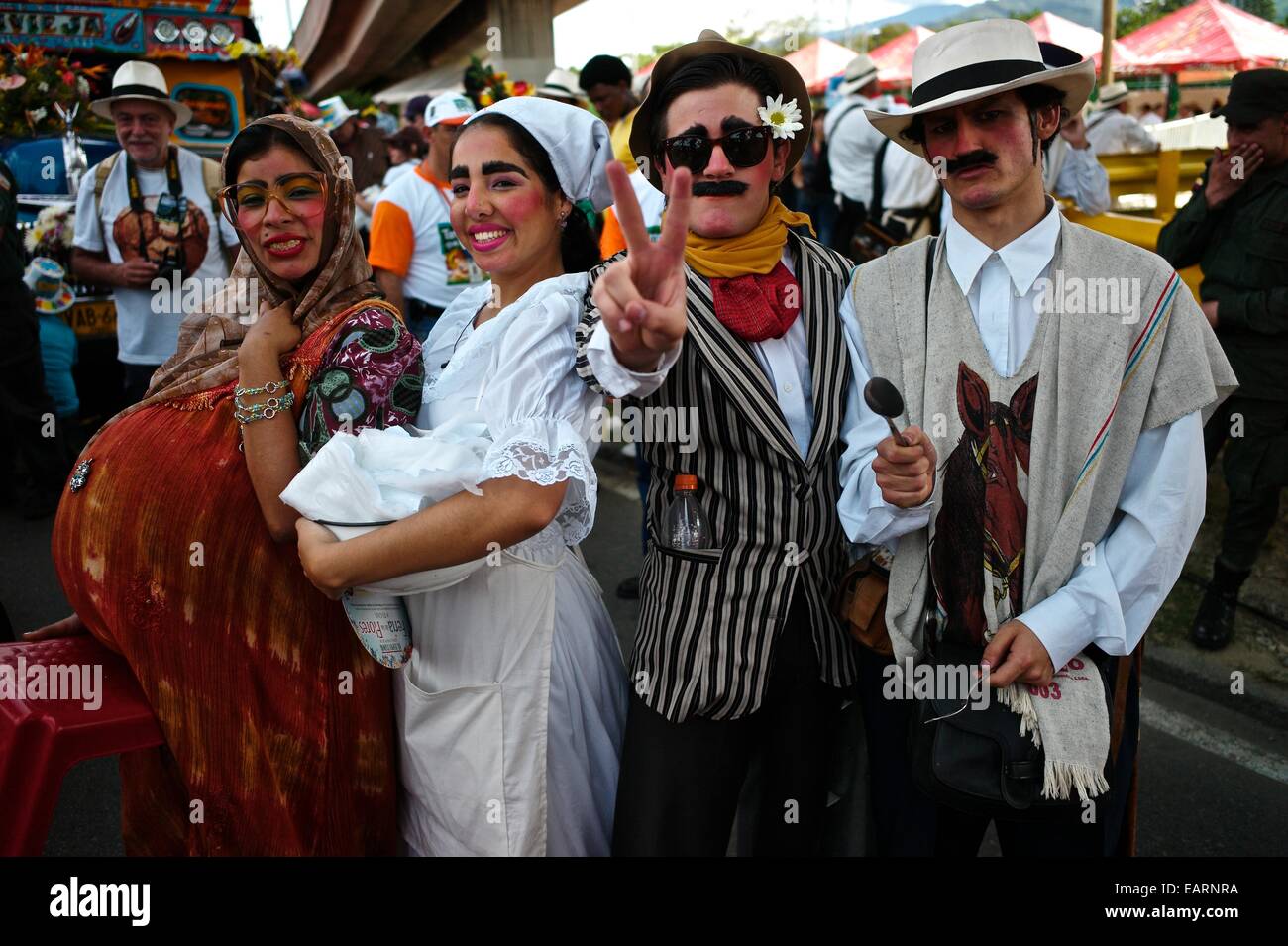 A group dressed in costumes pose at the Medellin flower festival Stock  Photo - Alamy