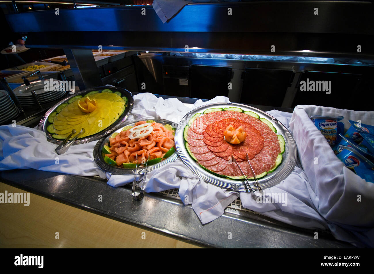 Cured meats and cheeses in an Antarctic ship's breakfast buffet. Stock Photo