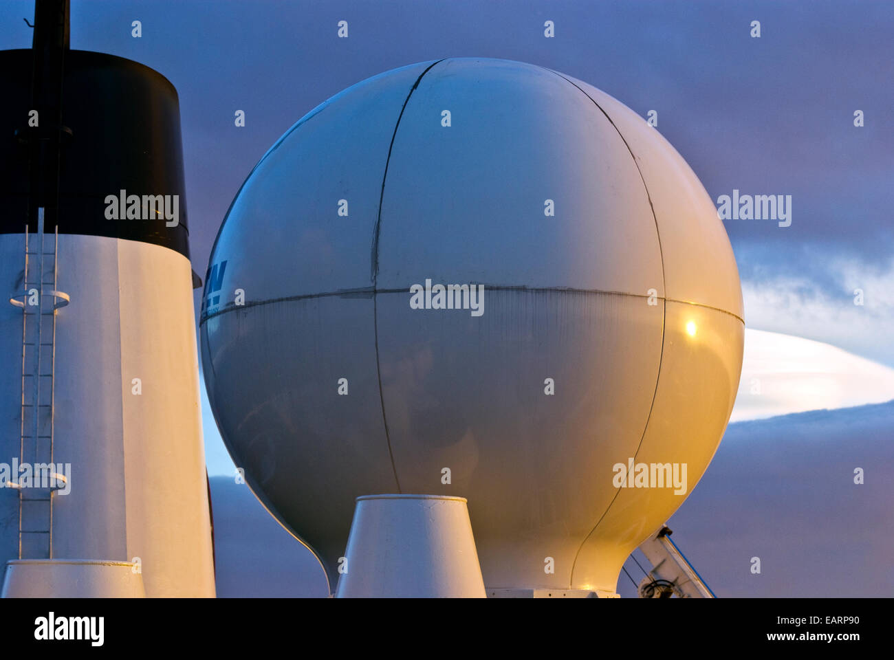 The polished dome of an Antarctic ship's satellite communication orb. Stock Photo