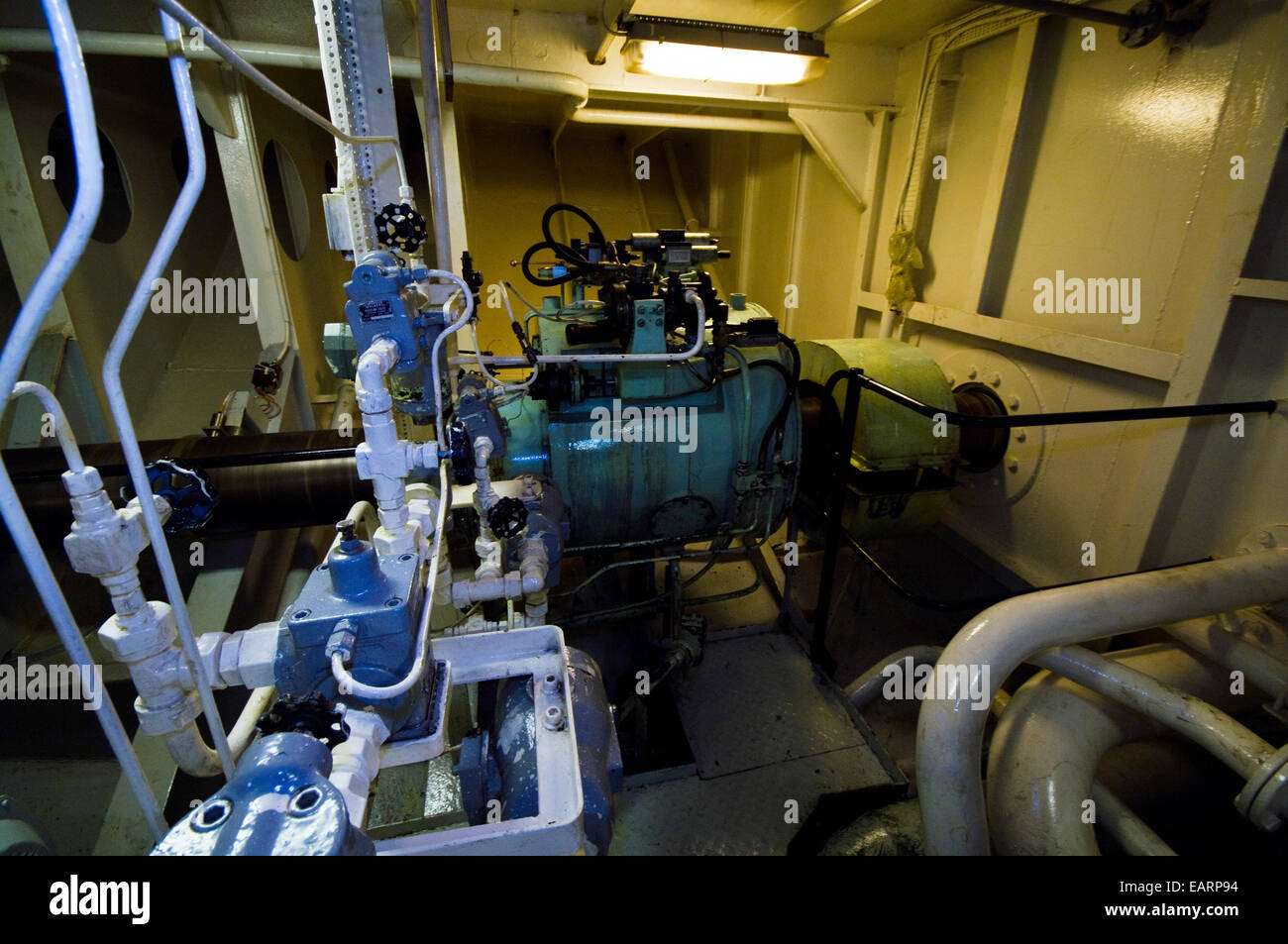 The engine room and a propeller shaft in an Antarctic ship. Stock Photo
