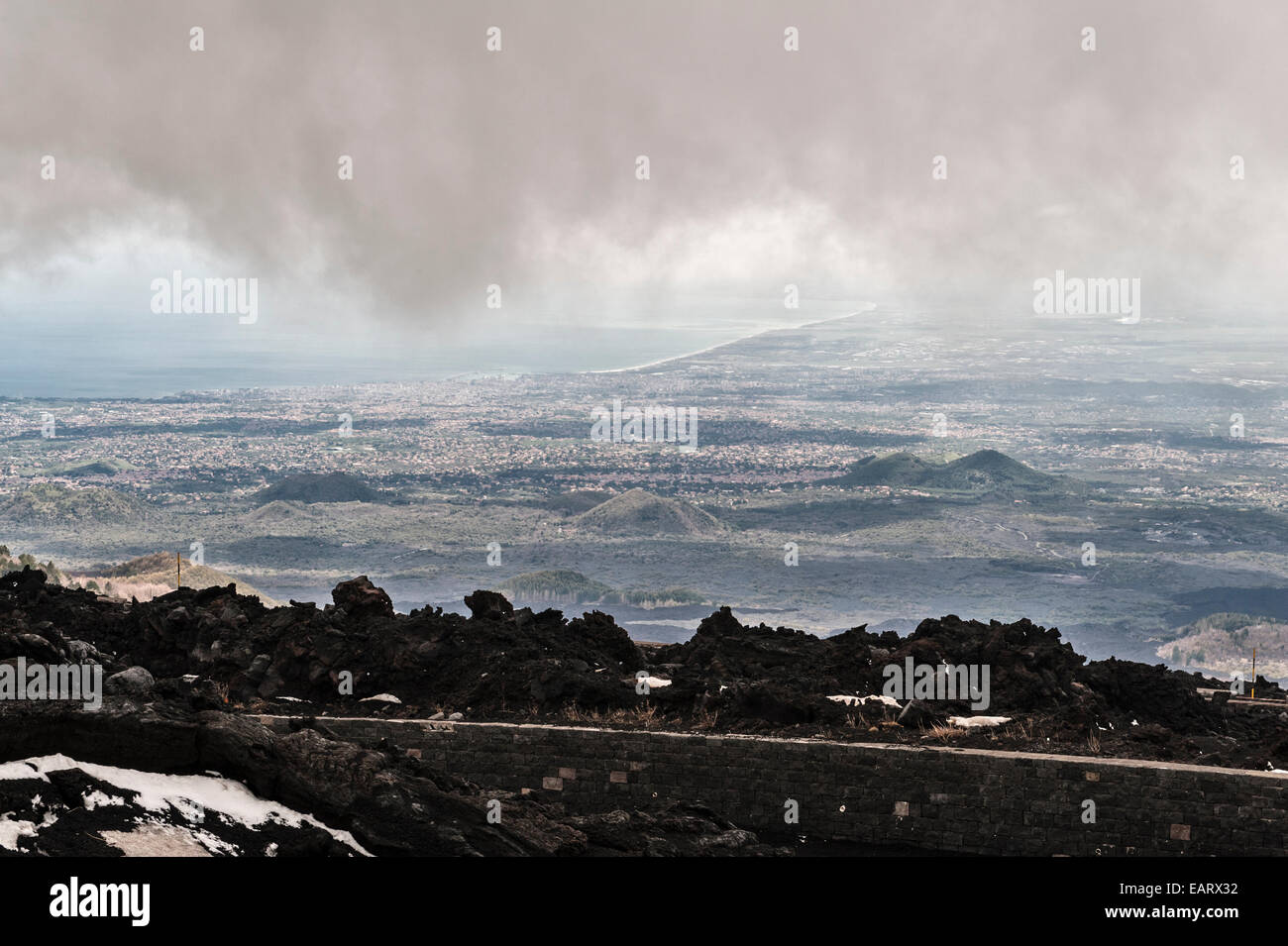 Sicily, Italy. The view from Mount Etna over the coast and the city of Catania Stock Photo