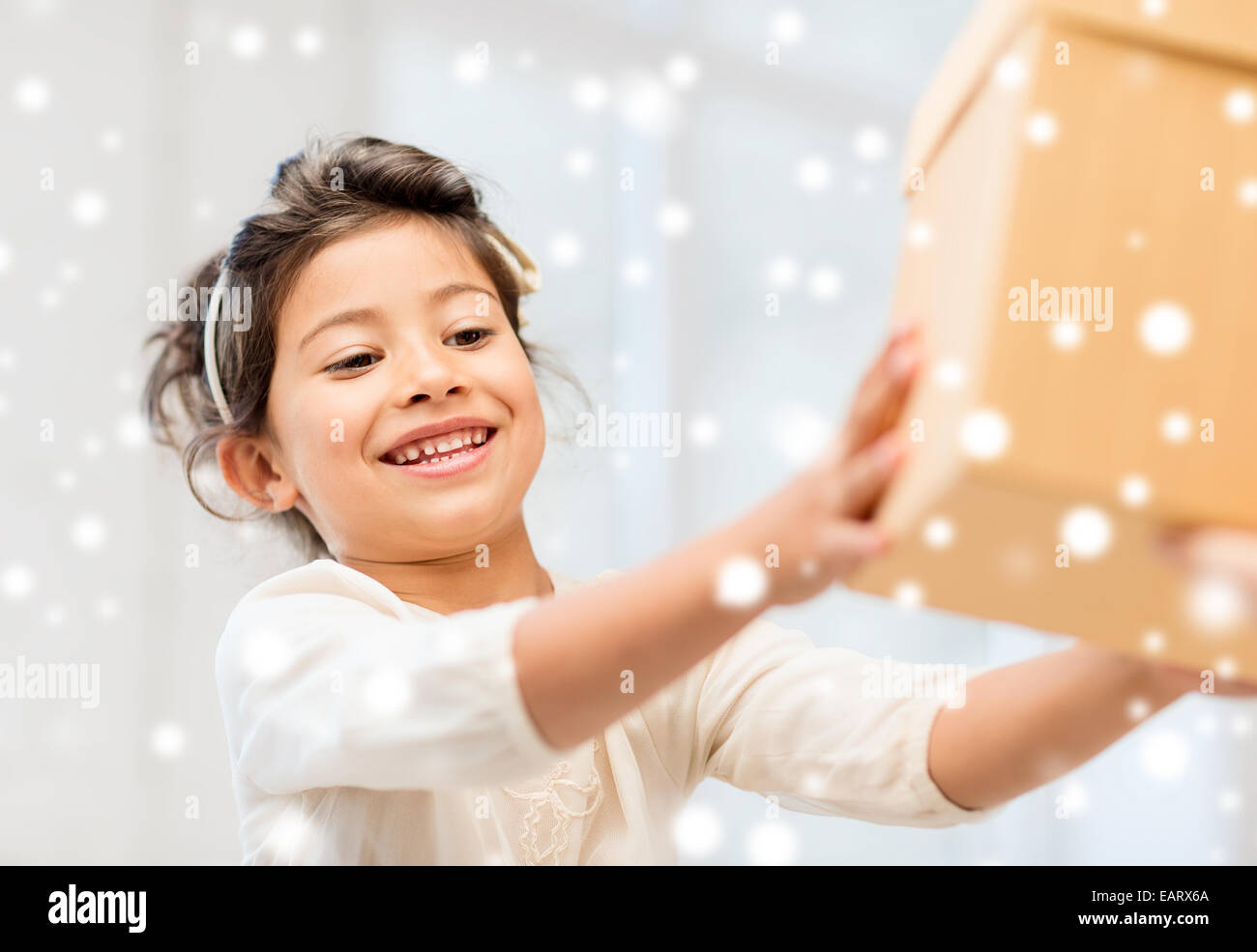 smiling little girl with gift box Stock Photo - Alamy