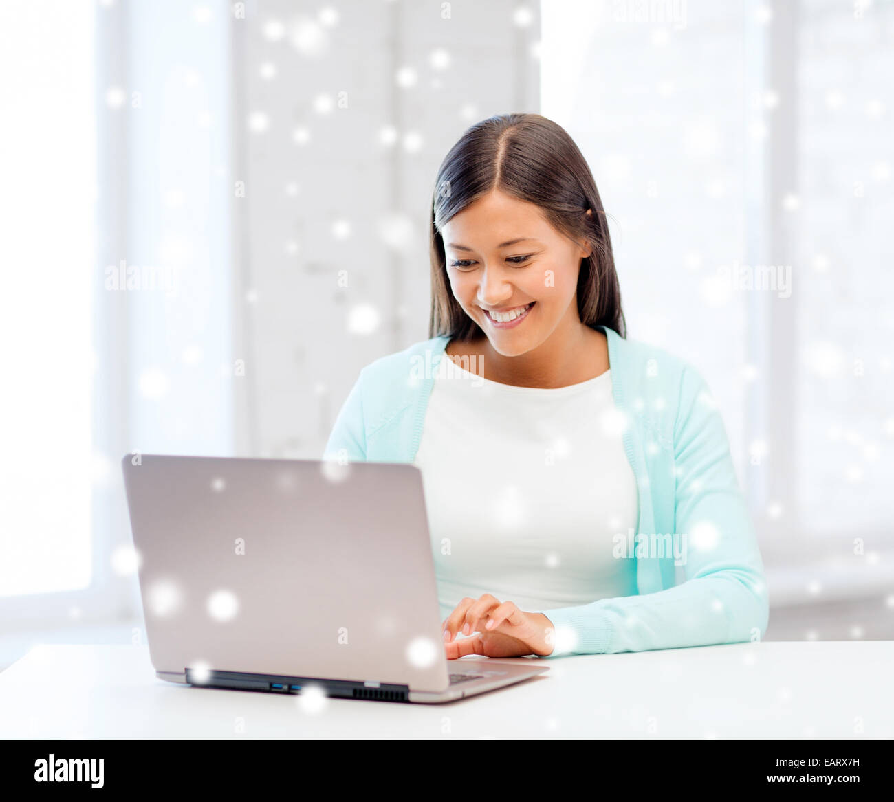 smiling young woman with laptop Stock Photo - Alamy