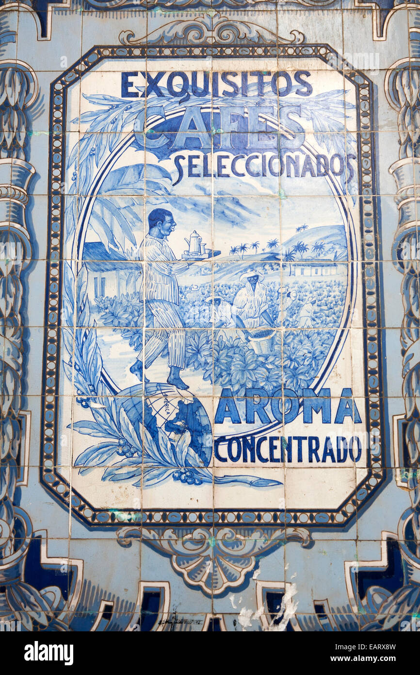 Antique advertisement using blue and white ceramic tiles to advertise coffee from the tropics, Seville, Spain Stock Photo