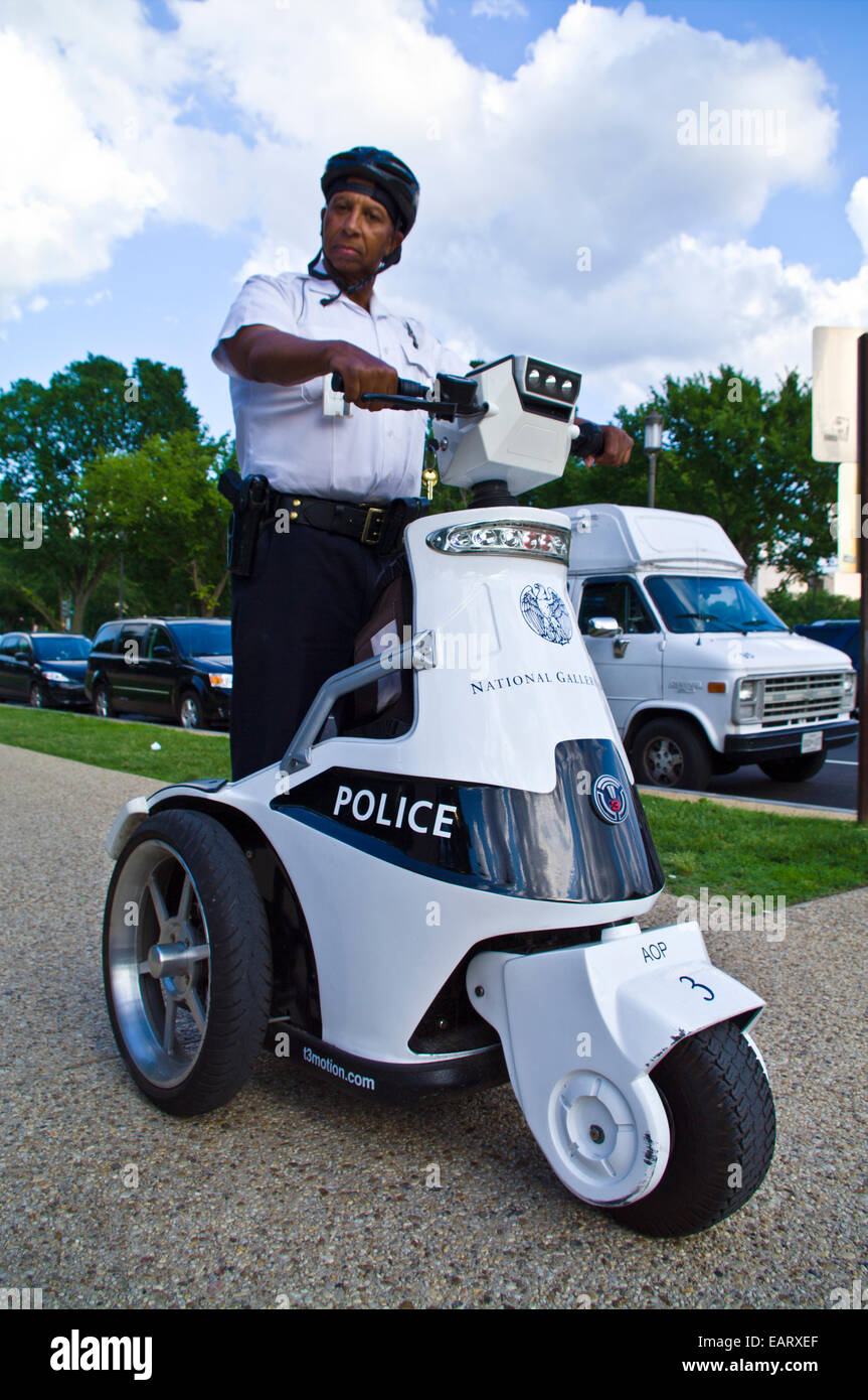 Police patrol the National Gallery of Art on electric scooters. Stock Photo