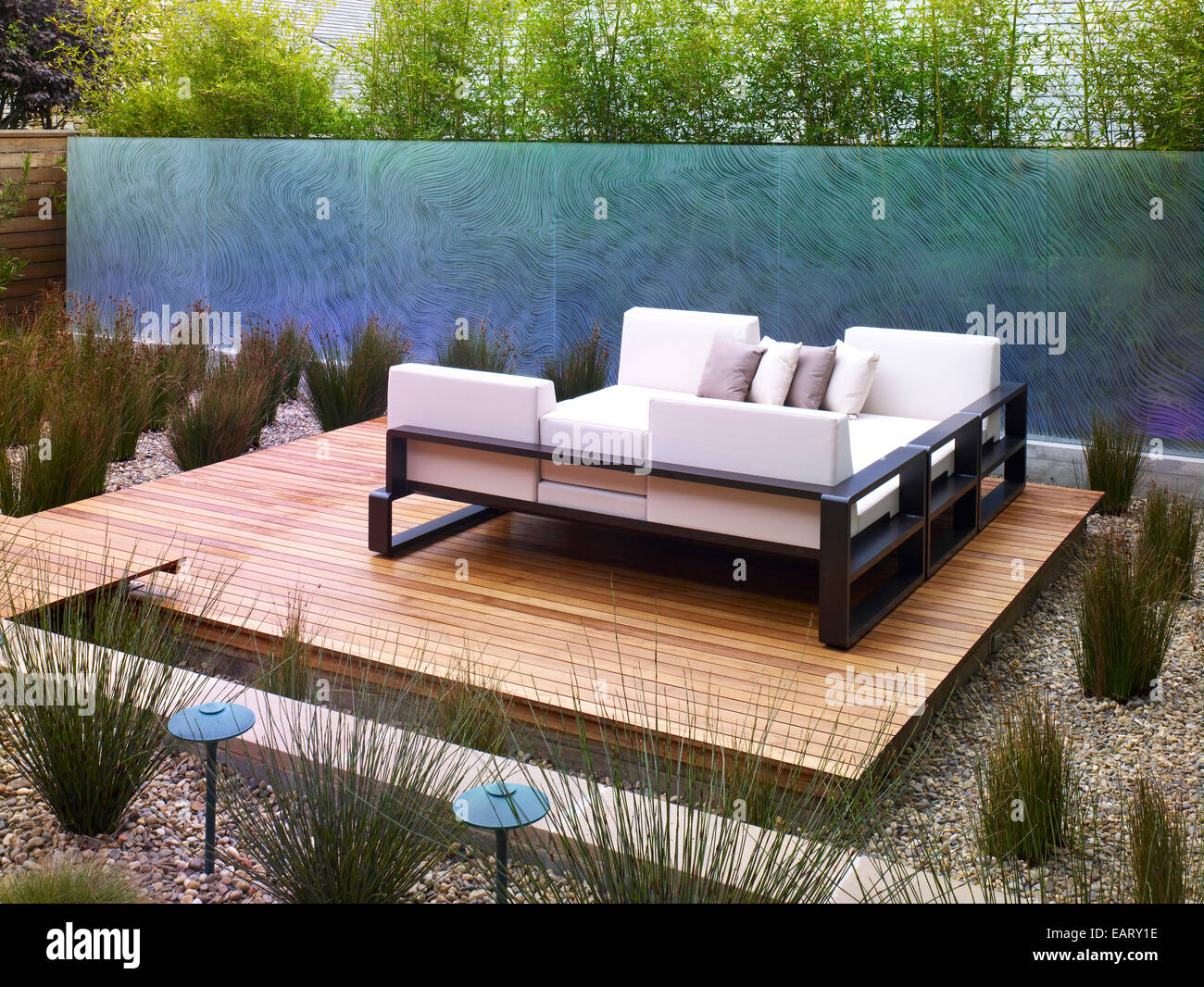Seating on decked patio area of garden, Odyssey House, Carmel, California Stock Photo