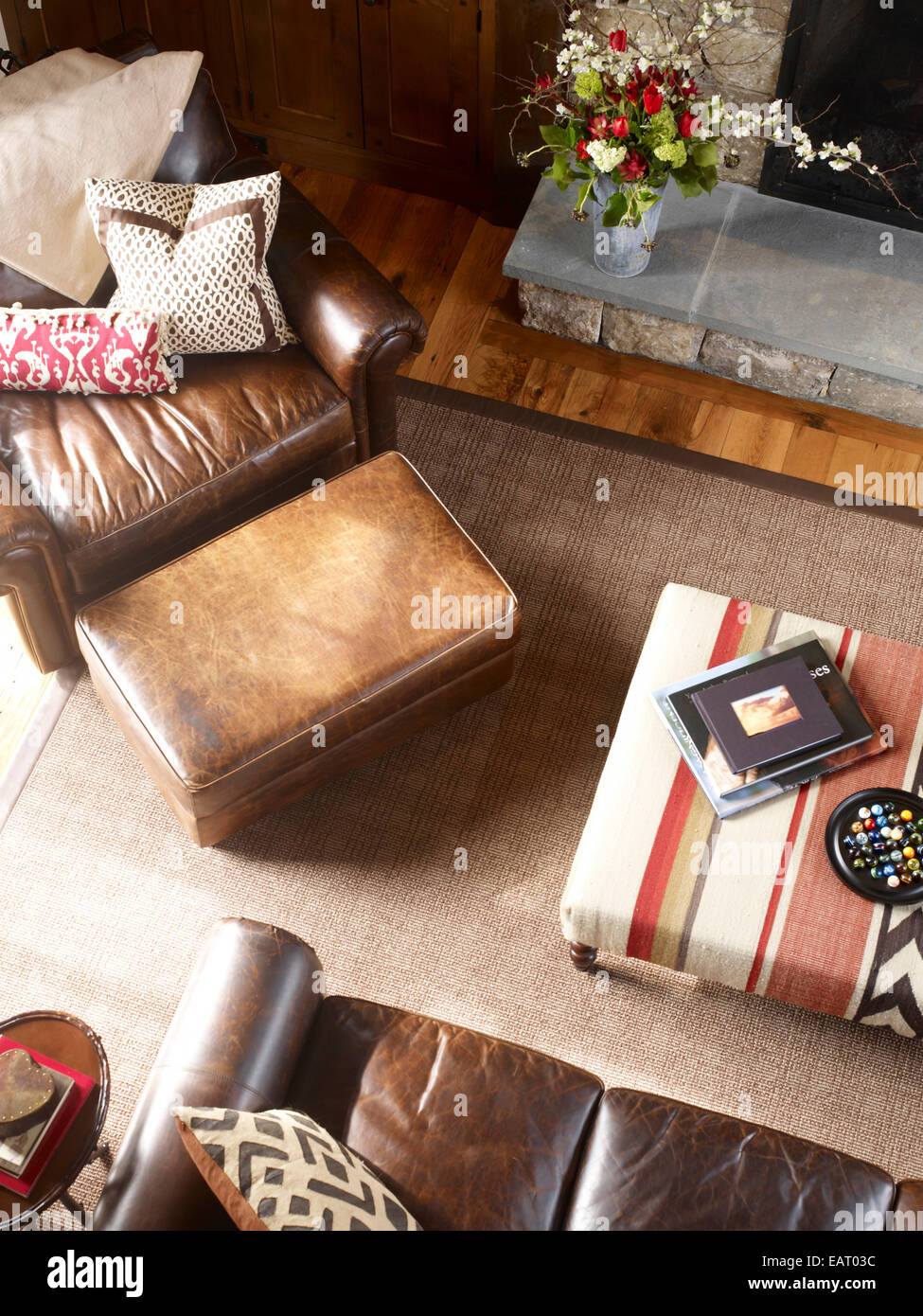 View from above of leather seating around table in living room, USA Stock Photo