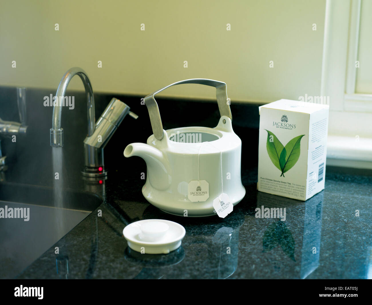 Tea bag in teapot on granite worktop in kitchen Stock Photo Alamy