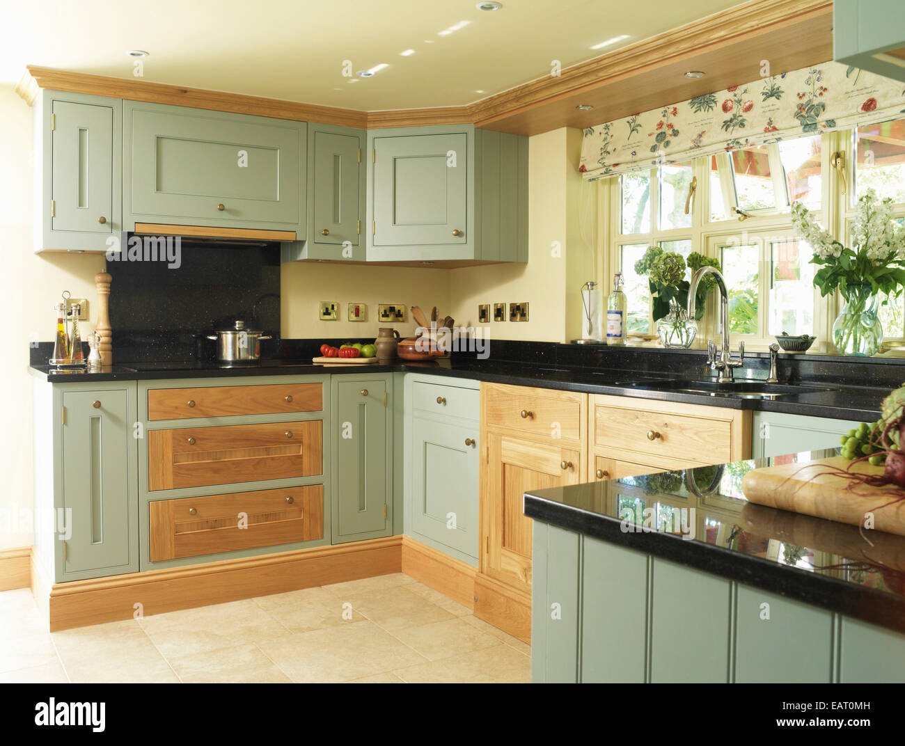 Country Style Kitchen With Green Fitted Units Stock Photo Alamy