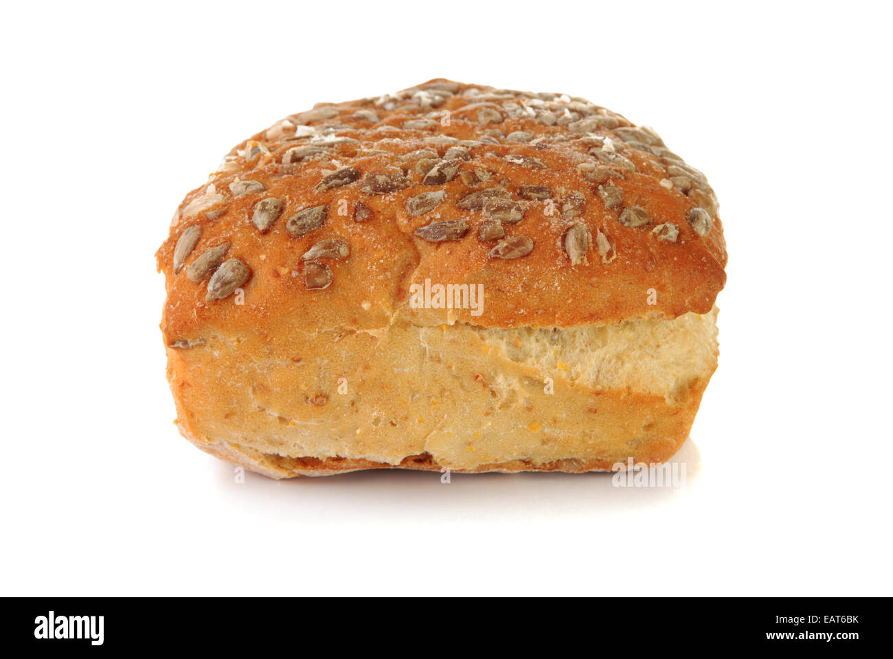 Close-up of a bun with sunflower seeds on white background Stock Photo