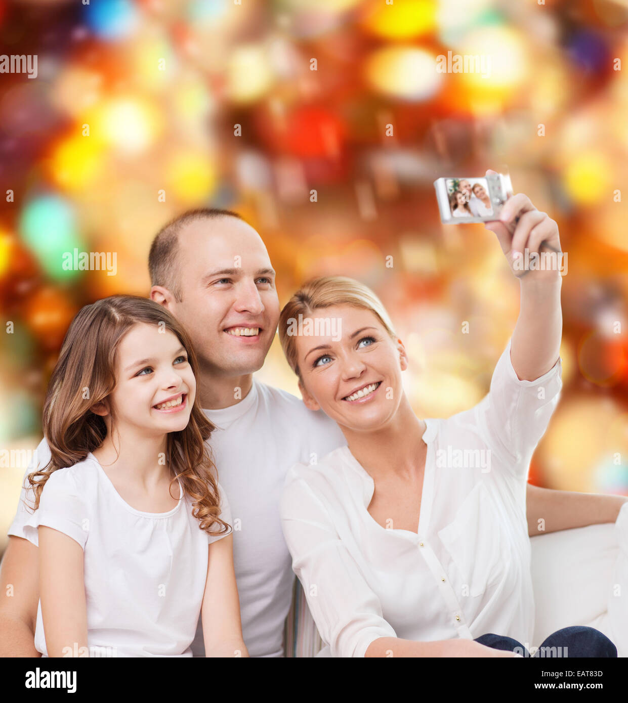 Family Using Filming Camera happy family with camera at home Stock Photo - Alamy