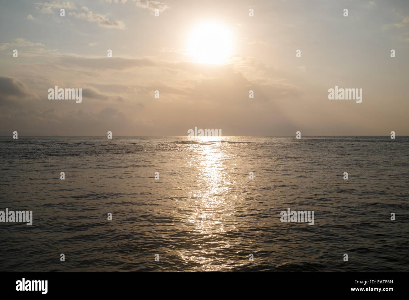 Sunrise over the sea. Bright reflection in the water Stock Photo - Alamy