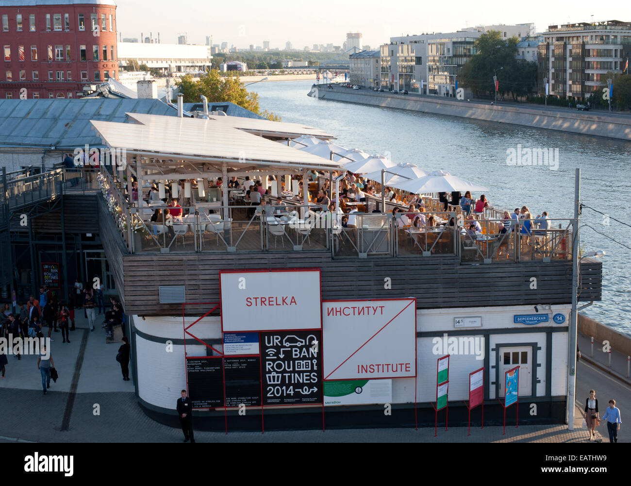 View  from patriarshy bridge on the institute Strelka , café on the veranda  and Moscow river Stock Photo