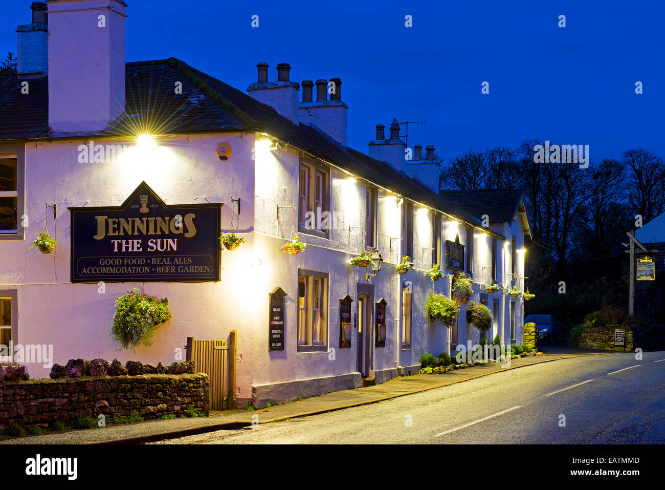 The Sun public house at dusk, Pooley Bridge, Lake District National Park, Cumbria, England UK