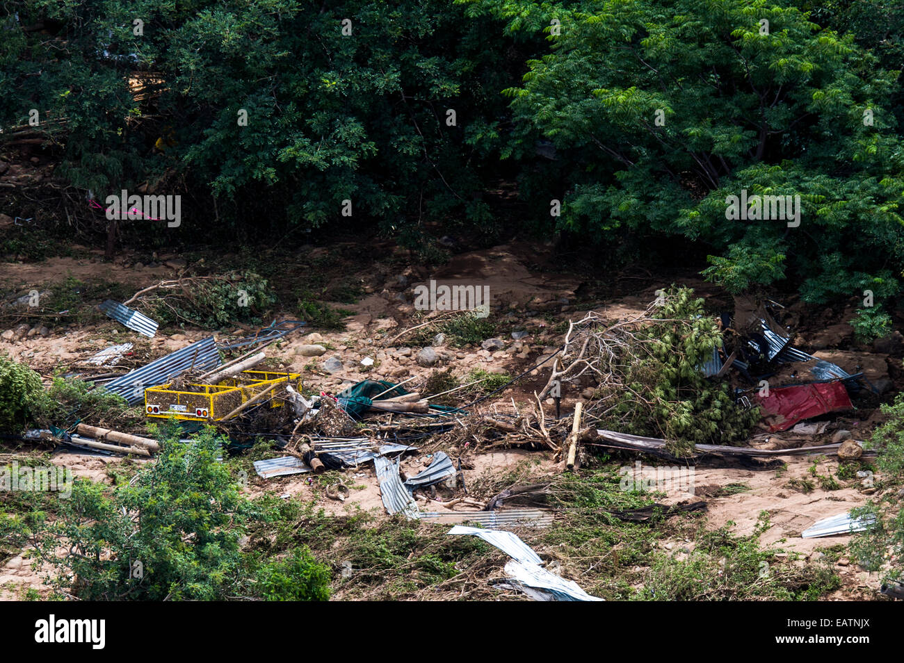 Debris from a savannah village destroyed by raging flood waters. Stock Photo