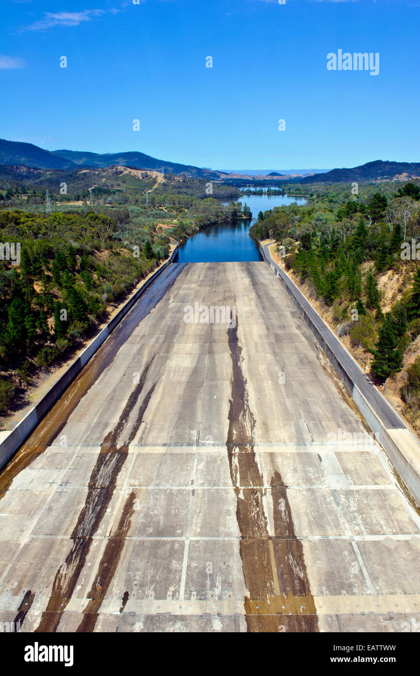 A vast concrete spillway chute to release water from a catchment dam. Stock Photo