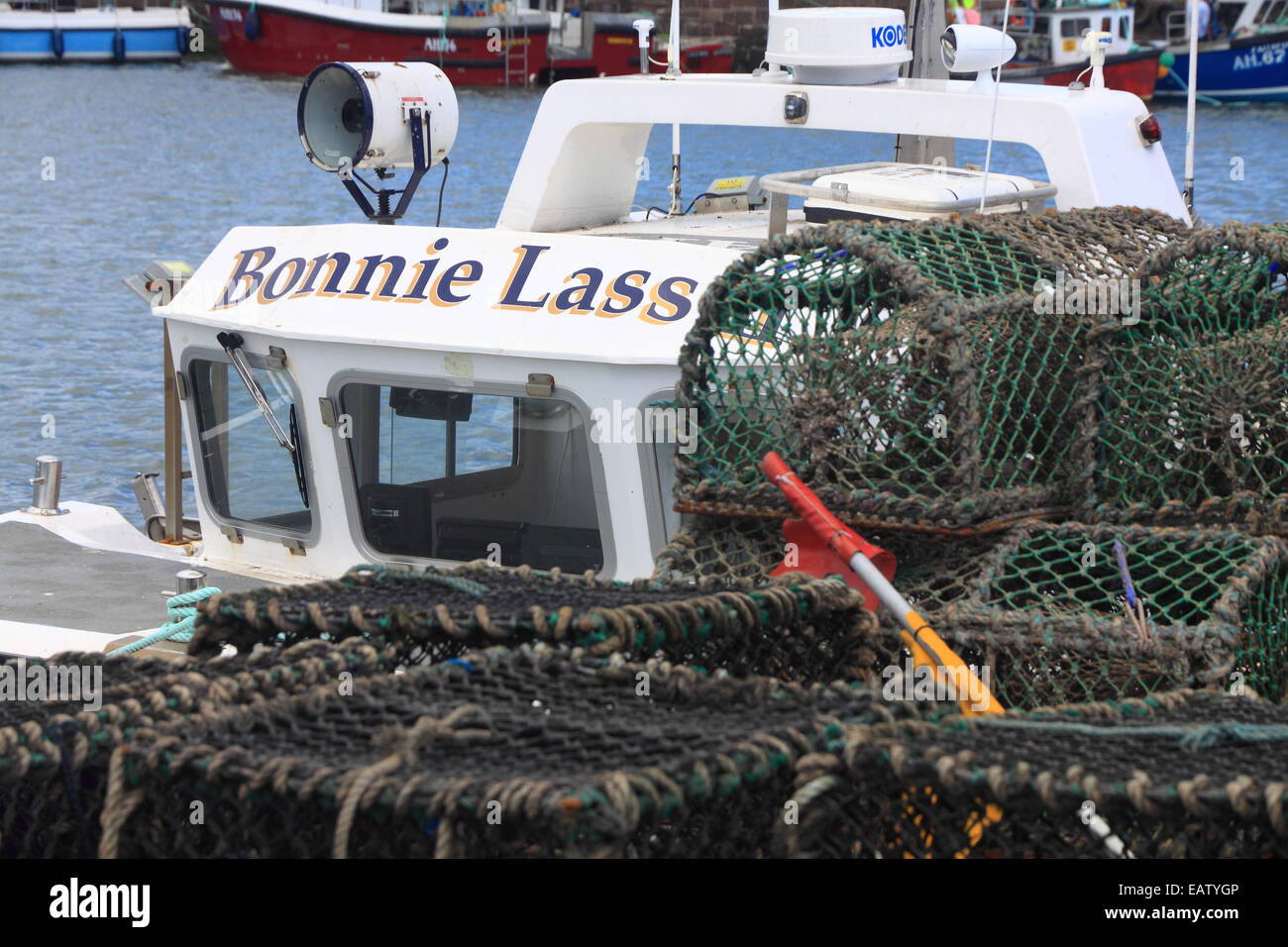 Small fishing boat and creels in Arbroath harbour, Scotland Stock Photo Alamy