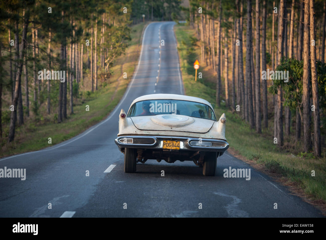 Old american car on a mountain road in Vinales Cuba Stock Photo