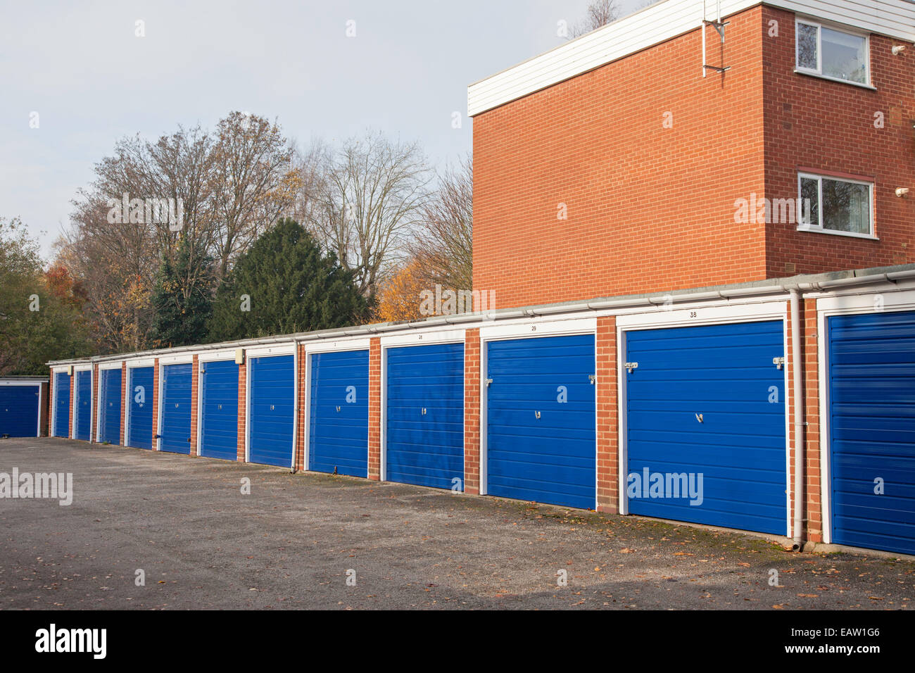Car garages on a housing estate, Birmingham, England, UK Stock Photo