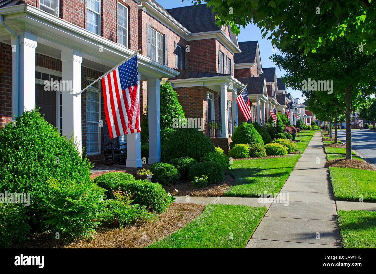 American Flags hang from the front porches in a