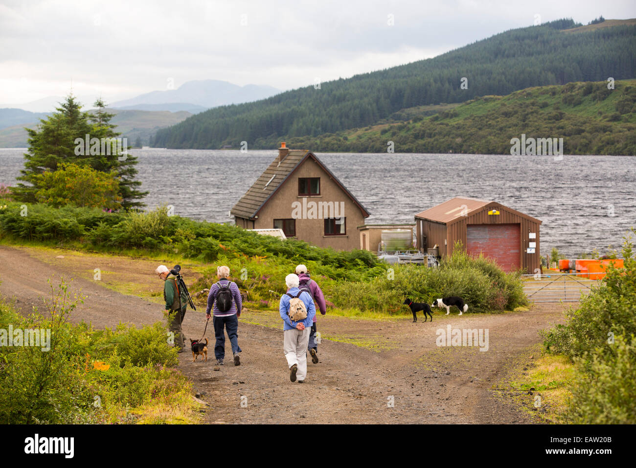 A family group walking along loch Frisa on the Isle of Mull, Scotland, UK. Stock Photo