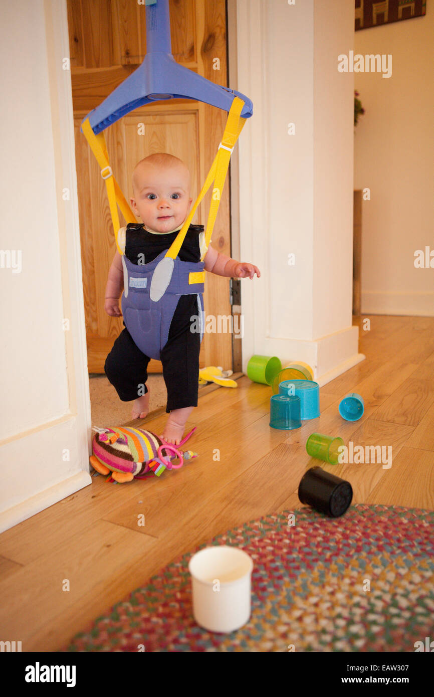 Baby In A Door Bouncer Stock Photo 75539191 Alamy