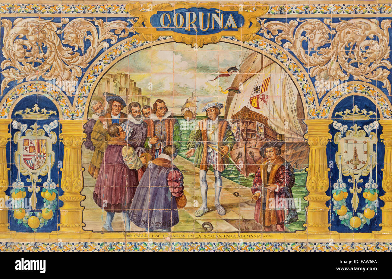 Seville - The Coruna as one of The tiled 'Province Alcoves' along the walls of the Plaza de Espana (1920s) by Domingo Prida. Stock Photo