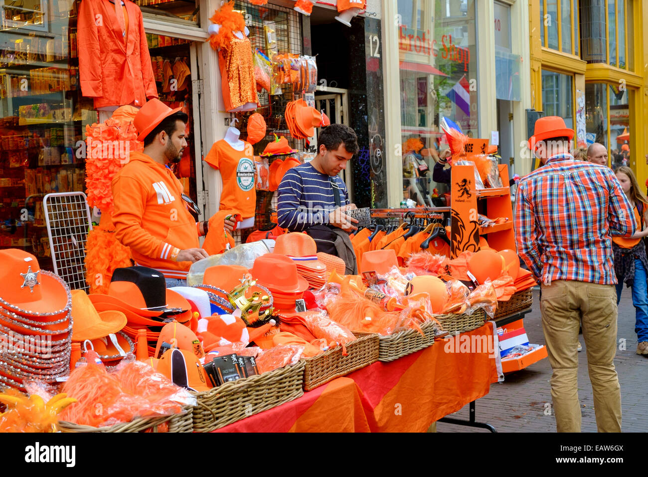 Vendors sell souvenirs and clothing in orange, the Dutch national color,  for King's Day. Former Queen?s Day, held since 1890, became King?s Day, or  Koningsdag this year. The change came last year