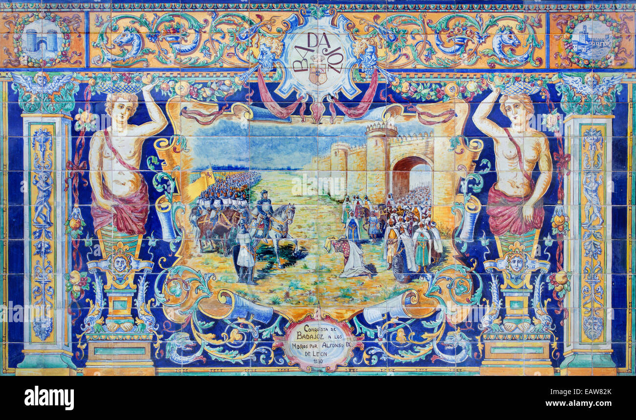 Seville - The Badajoz as one of The tiled 'Province Alcoves' along the walls of the Plaza de Espana (1920s) by Domingo Prida. Stock Photo