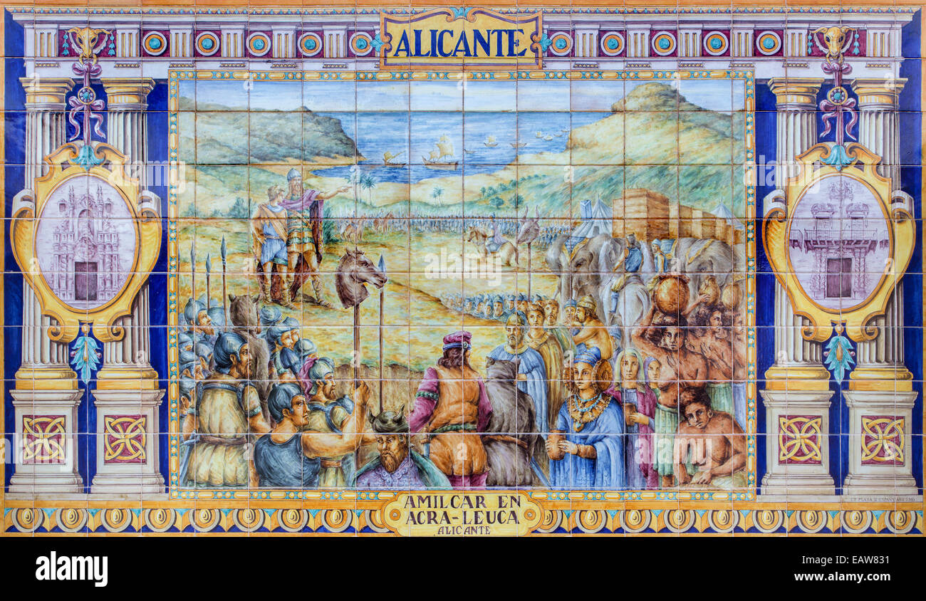 Sevilel - The Alicante as one of The tiled 'Province Alcoves' along the walls of the Plaza de Espana (1920s) by Domingo Prida. Stock Photo