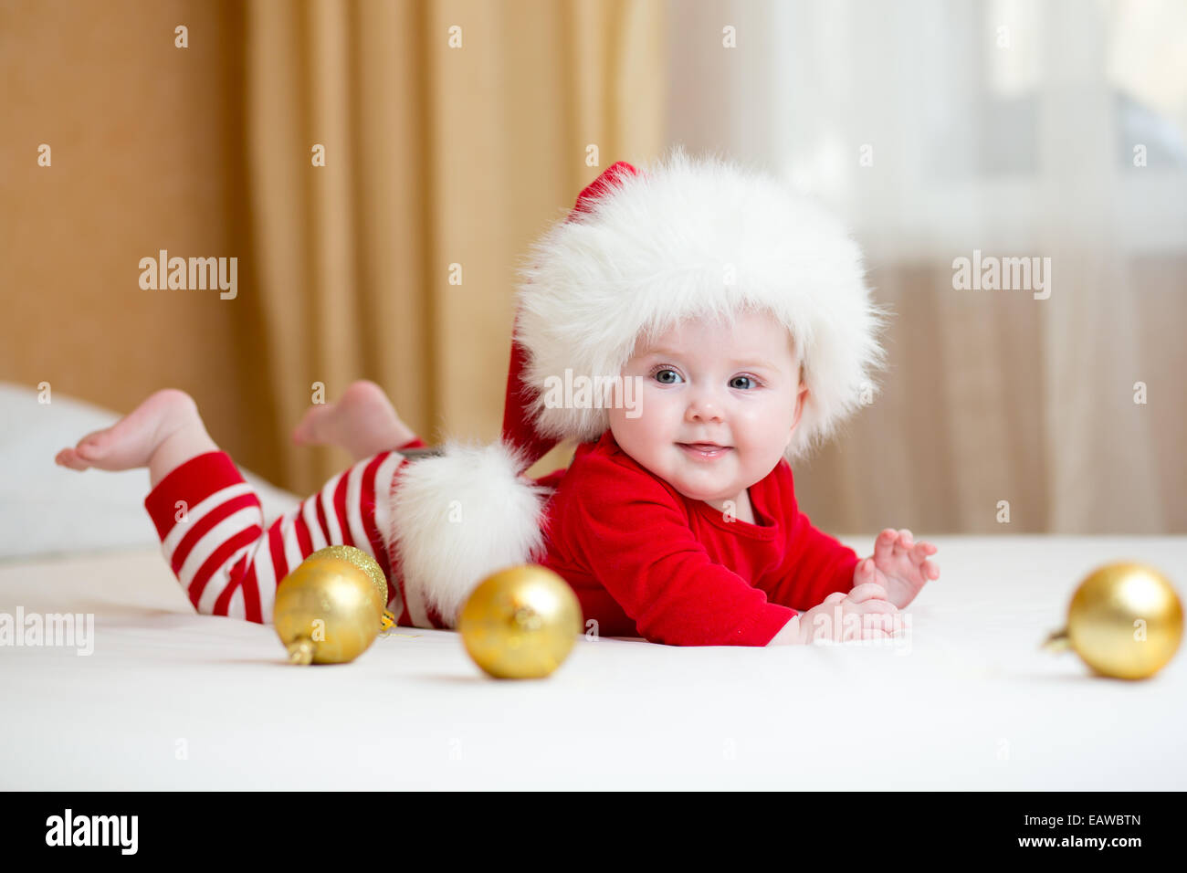 Cute Baby girl weared Christmas clothes Stock Photo