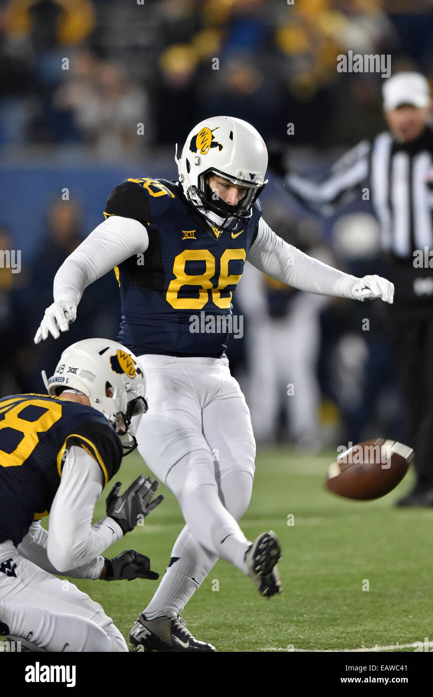 Morgantown, West Virginia, USA. 20th Nov, 2014. West Virginia Mountaineers place kicker JOSH LAMBERT (86) kicks a field goal late in a Big 12 conference football game between WVU and Kansas State that is being played at Mountaineer Field in Morgantown, WV. Kansas State beat WVU 26-20. © Ken Inness/ZUMA Wire/Alamy Live News Stock Photo