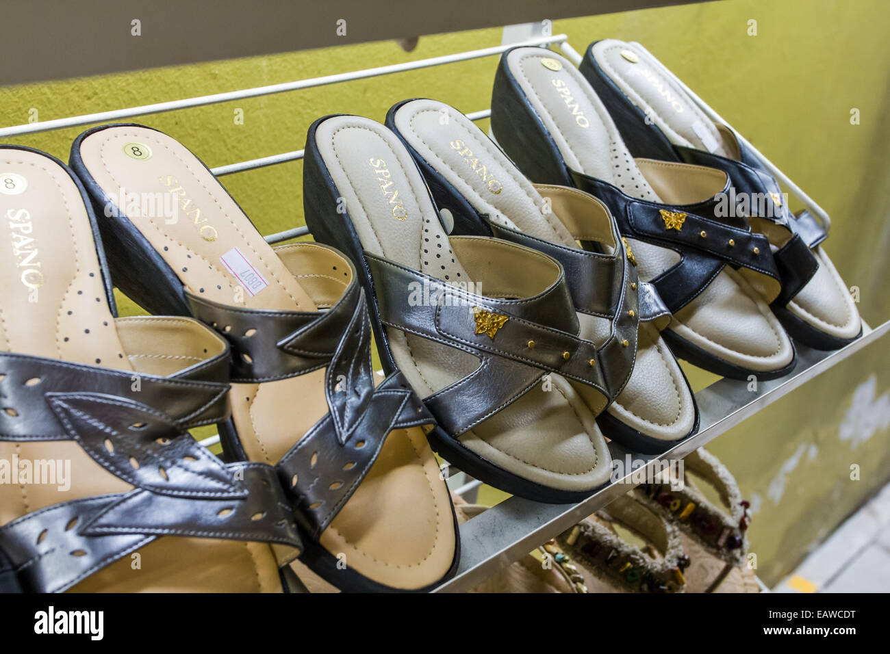 Shoes on display in shopping mall Stock Photo - Alamy