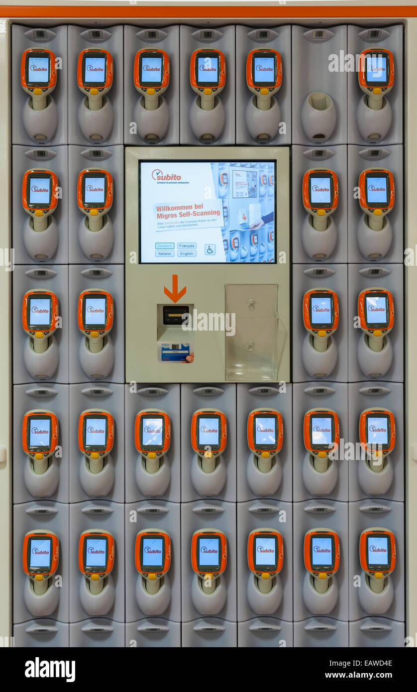 Rack with handheld Subito self-scanning devices in a Migros supermarket in  Zurich, Switzerland Stock Photo - Alamy