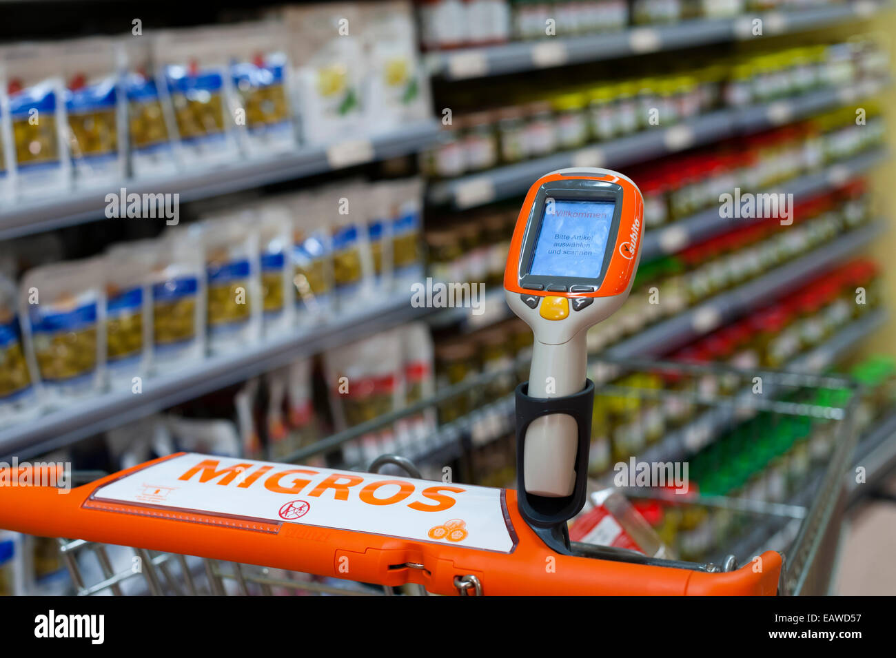 A handheld Subito self-scanning device fixed to a shopping cart in a Migros  supermarket in Zurich, Switzerland Stock Photo - Alamy