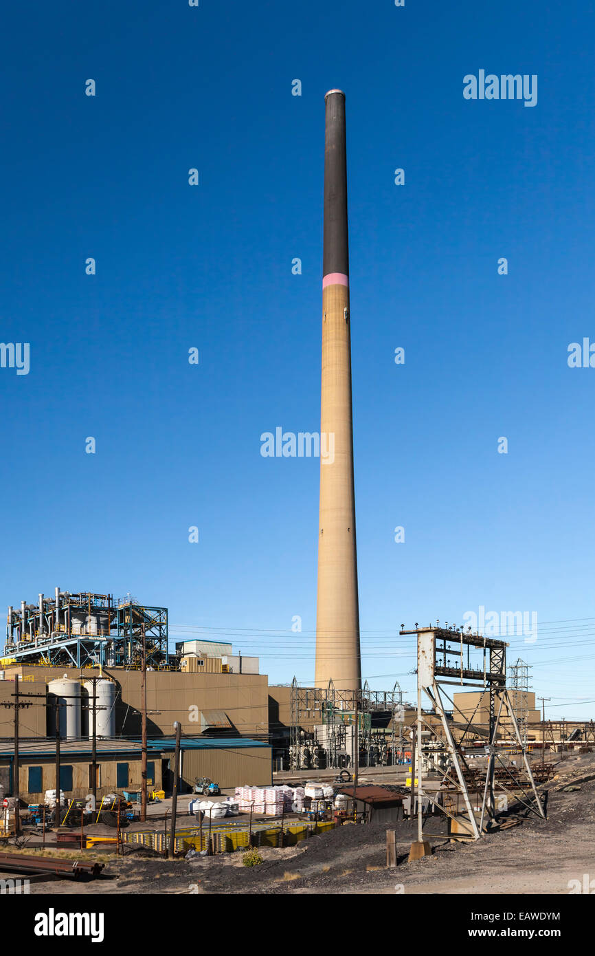 A tall smoke stack chimney at the Hudson's Bay Mining and Smelting Co