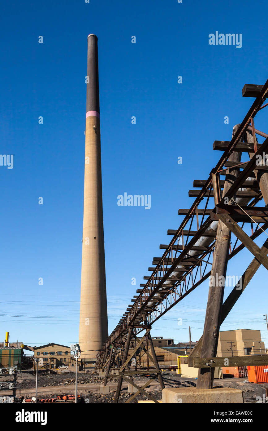 A tall smoke stack chimney at the Hudson's Bay Mining and Smelting Co