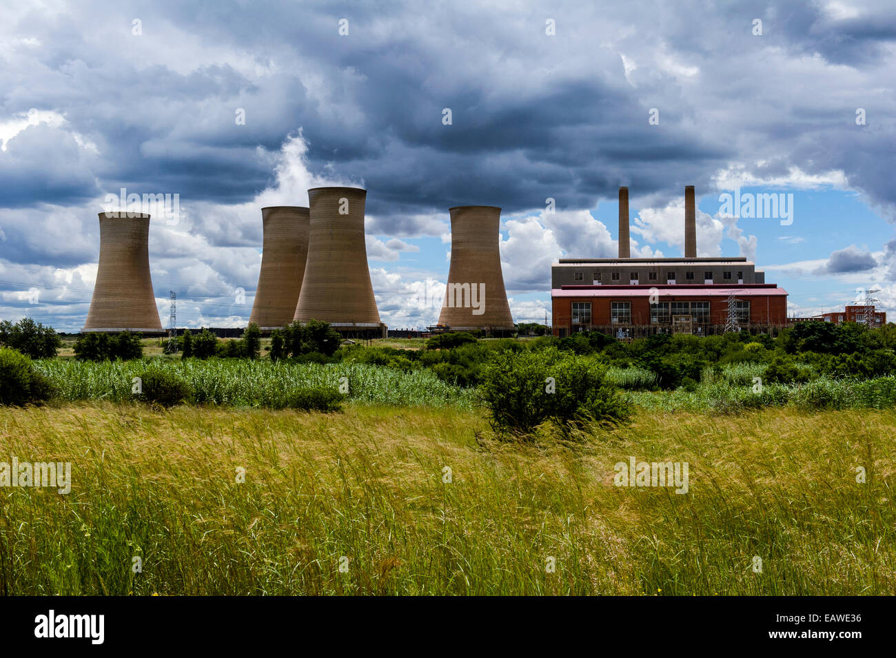 Cooling towers and chimneys of an electricity power station. Stock Photo