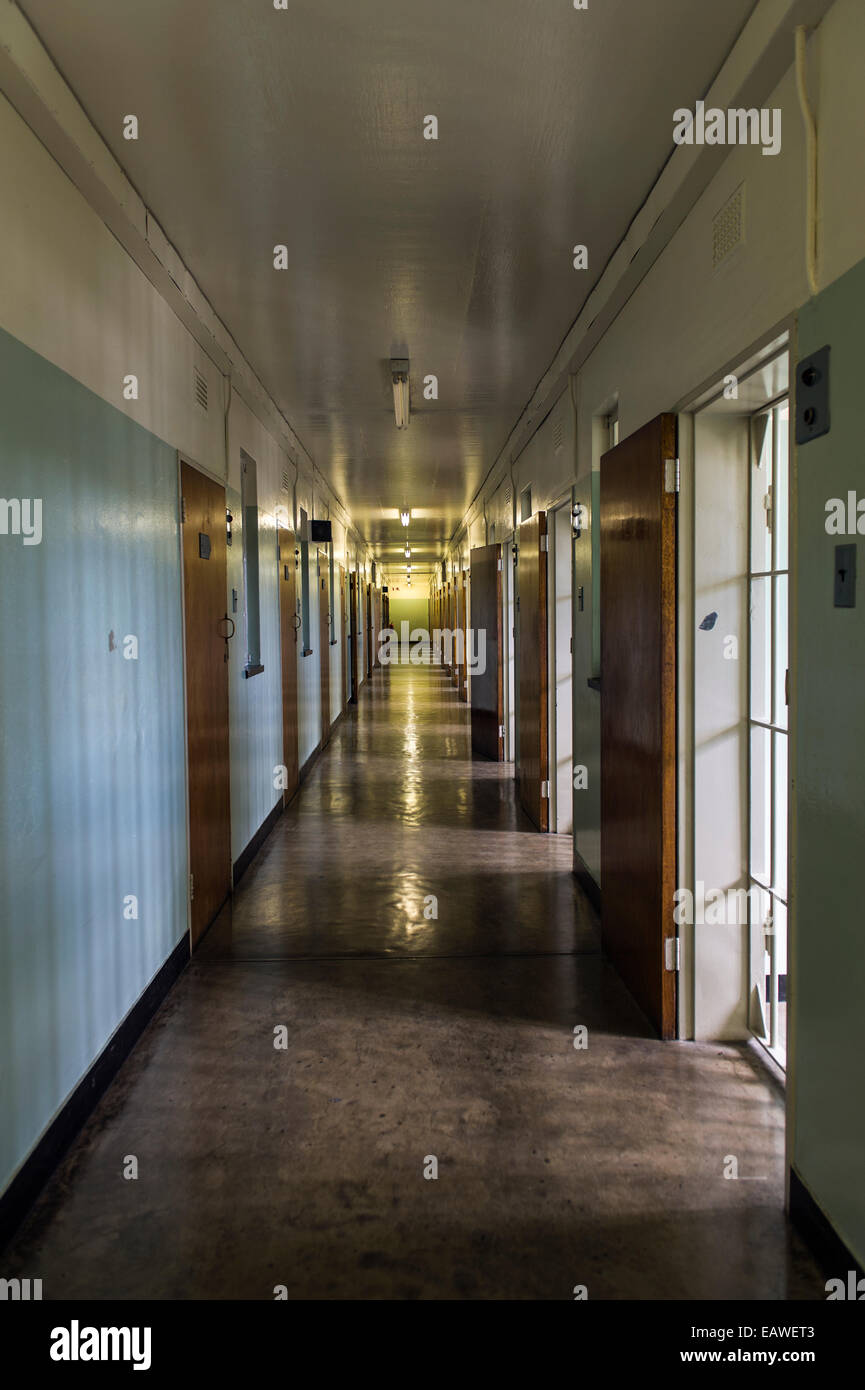 A corridor leads past Nelson Mandela's prison cell on Robben Island. Stock Photo
