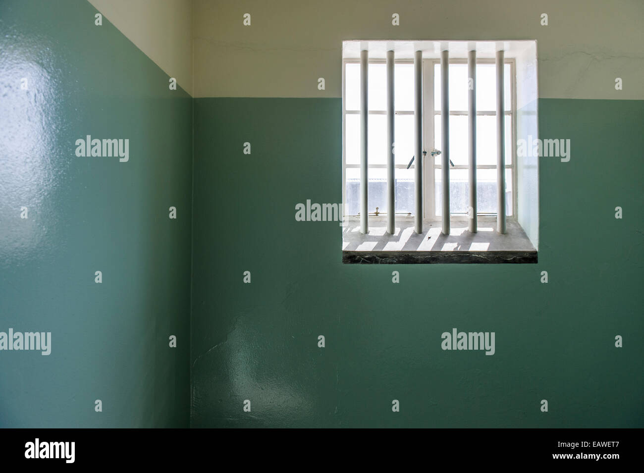 A lone window illuminates the prison cell inhabited by Nelson Mandela. Stock Photo