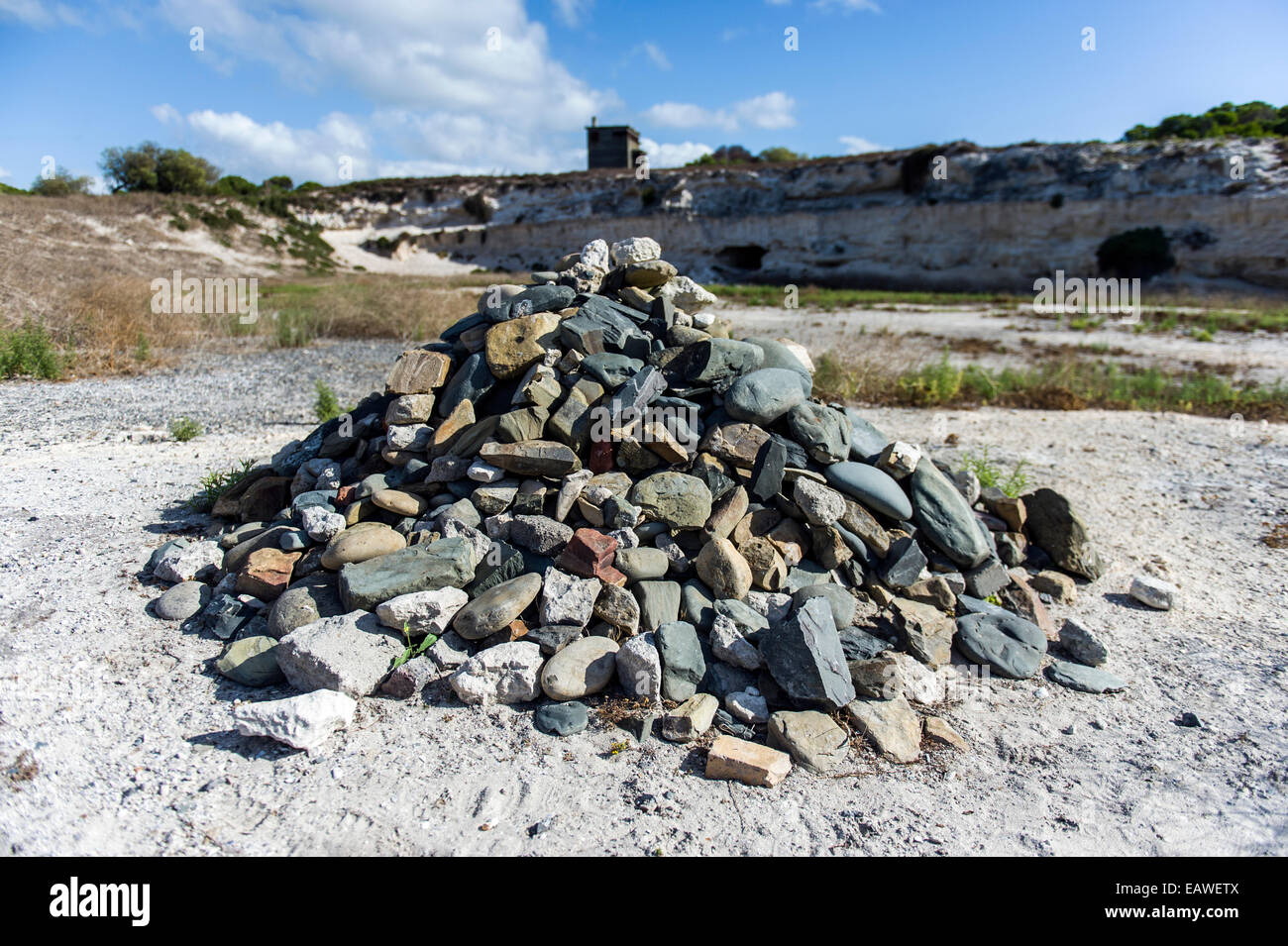 Memorial rock pile started by Nelson Mandela in a prison limestone quarry. Stock Photo