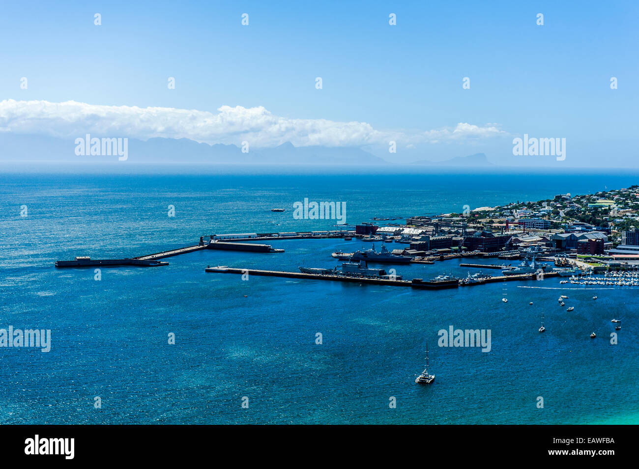 South African Navy military vessels at port in a sheltered harbor. Stock Photo