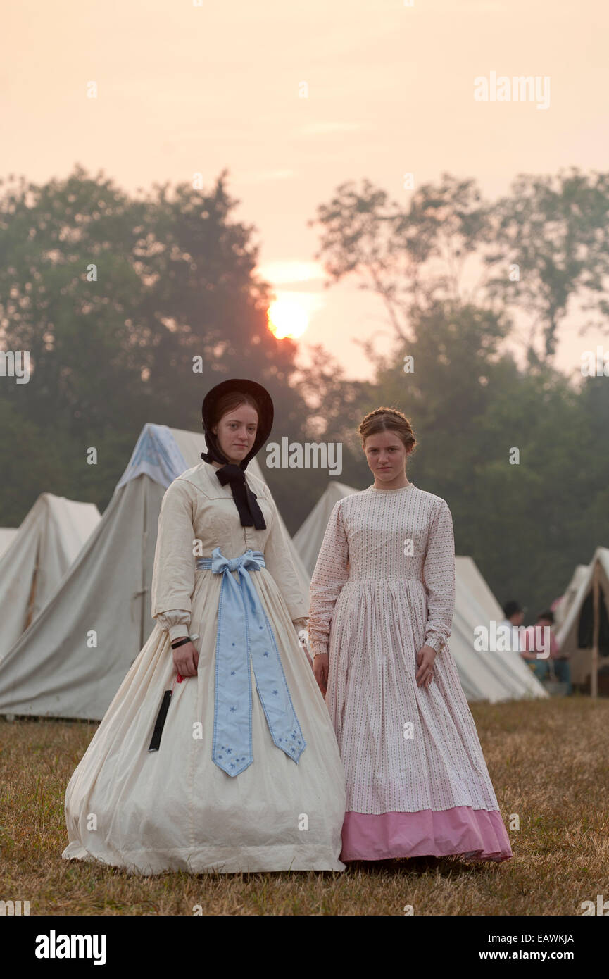 Young women in period costume at a Civil War reenactment. Stock Photo