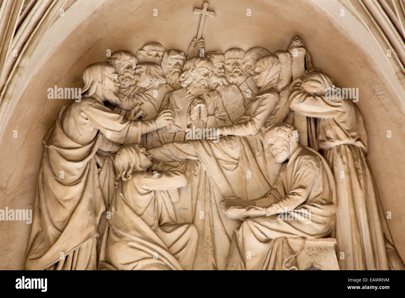 VIENNA, AUSTRIA - JULY 3, 2013: The relief of the death of Virgin Mary on the south portal of gothic church Maria am Gestade. Stock Photo
