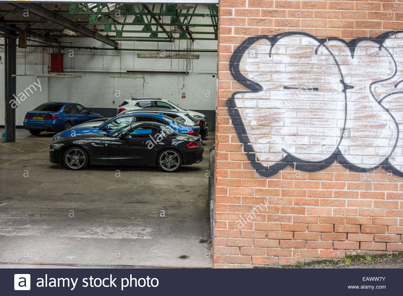 Expensive Cars Parked In A Secure Garage In Sheffield With