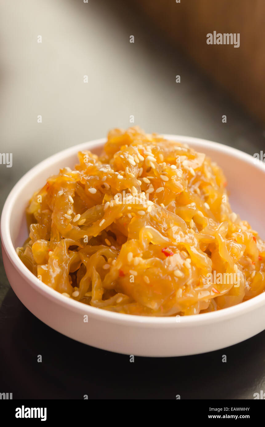 gourmet tossed jellyfish salad in white bowl , Chinese cuisine Stock Photo