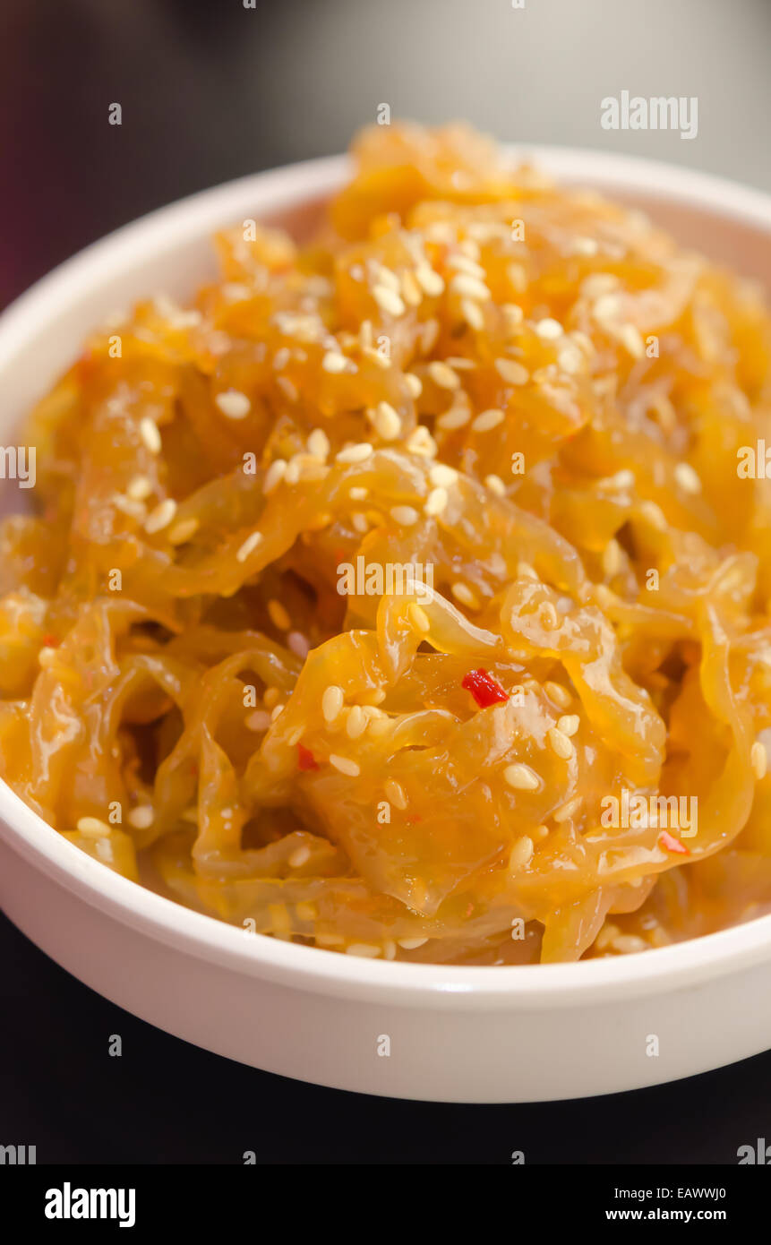 gourmet tossed jellyfish salad in white bowl , Chinese cuisine Stock Photo