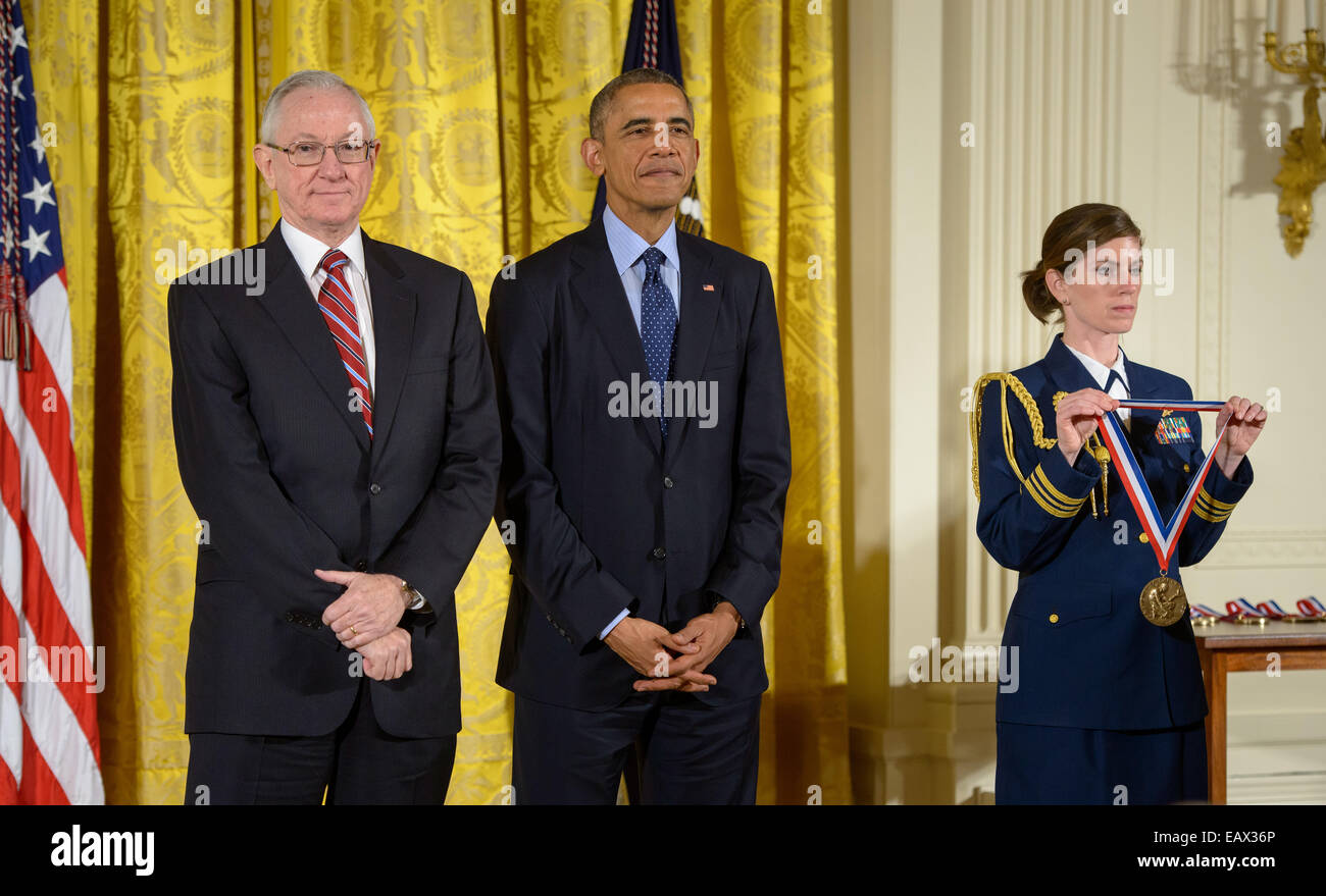 US President Barack Obama bestows the National Medal of Science to Sean Solomon, director of Columbia University's Lamont-Doherty Earth Observatory, during a ceremony in the East Room of the White House November 20, 2014 in Washington. Stock Photo